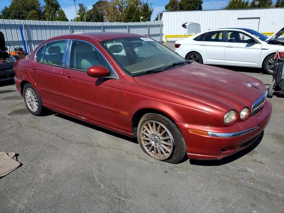 2007 Jaguar X type VIN SAJWA51AX7WJ17296 COPART salvage auction — MINOR DENT/SCRATCHES, CA - DIS/DLR/EXP ONLY CLEAN TITLE, sold $100 on 2026-09-11 (photo 4)