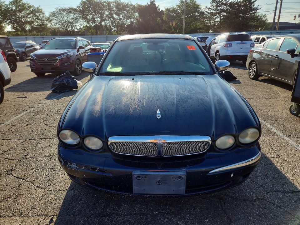 2006 Jaguar X type VIN SAJWA51A16WE94407 COPART salvage auction — MINOR DENT/SCRATCHES, Oh - Certificate Of Title, sold $275 on 2026-09-09 (photo 5)