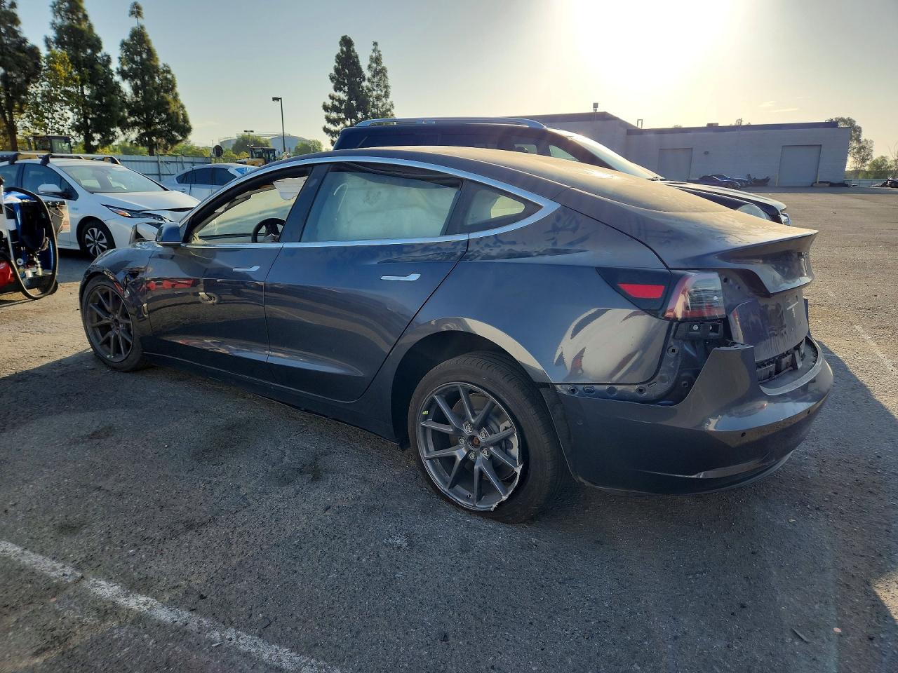 2018 Tesla Model 3 VIN 5YJ3E1EA3JF157661 COPART salvage auction — All Over, CA - DIS/DLR/EXP ONLY CLEAN TITLE (P), sold $1,950 on 2026-10-02 (photo 2)