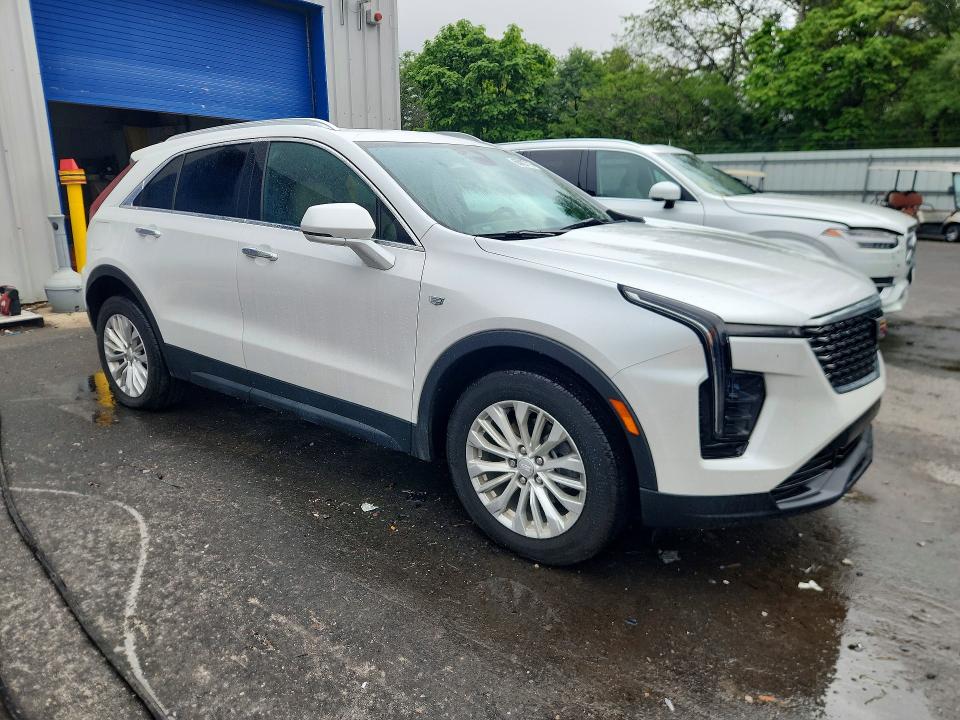 2024 Cadillac Xt4 VIN 1GYFZBR45RF142866 COPART salvage auction — WATER/FLOOD, Pa - Cert Of Salvage-W=Flood Veh, sold $13,700 on 2026-09-01 (photo 4)