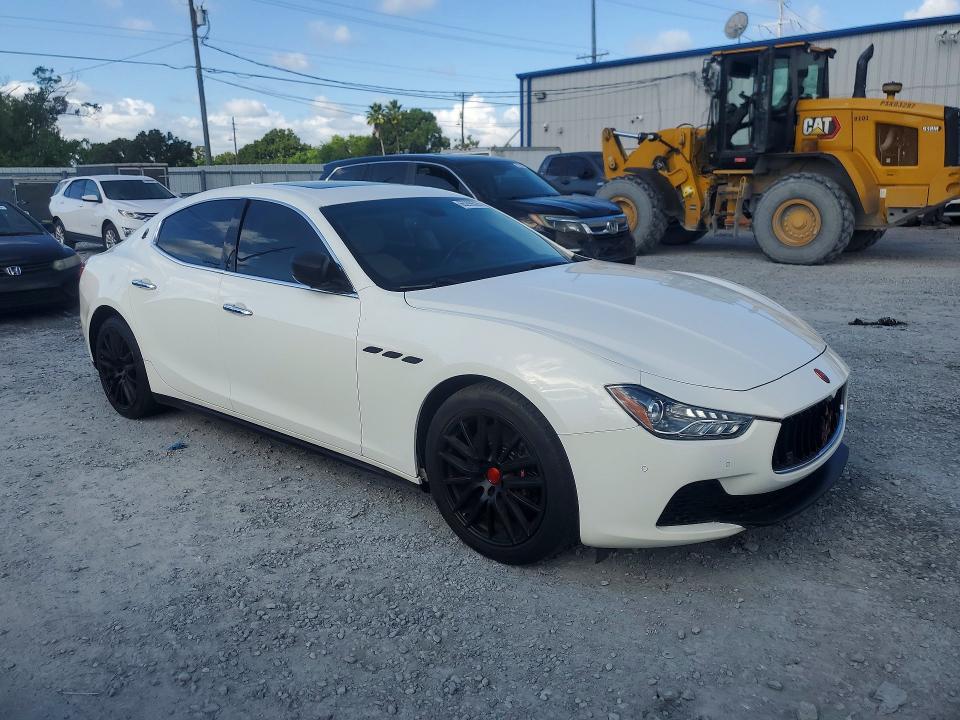 2014 Maserati Ghibli VIN ZAM57RTA3E1094737 COPART salvage auction — MECHANICAL, Fl - Certificate Of Title, sold $1,600 on 2026-08-27 (photo 4)