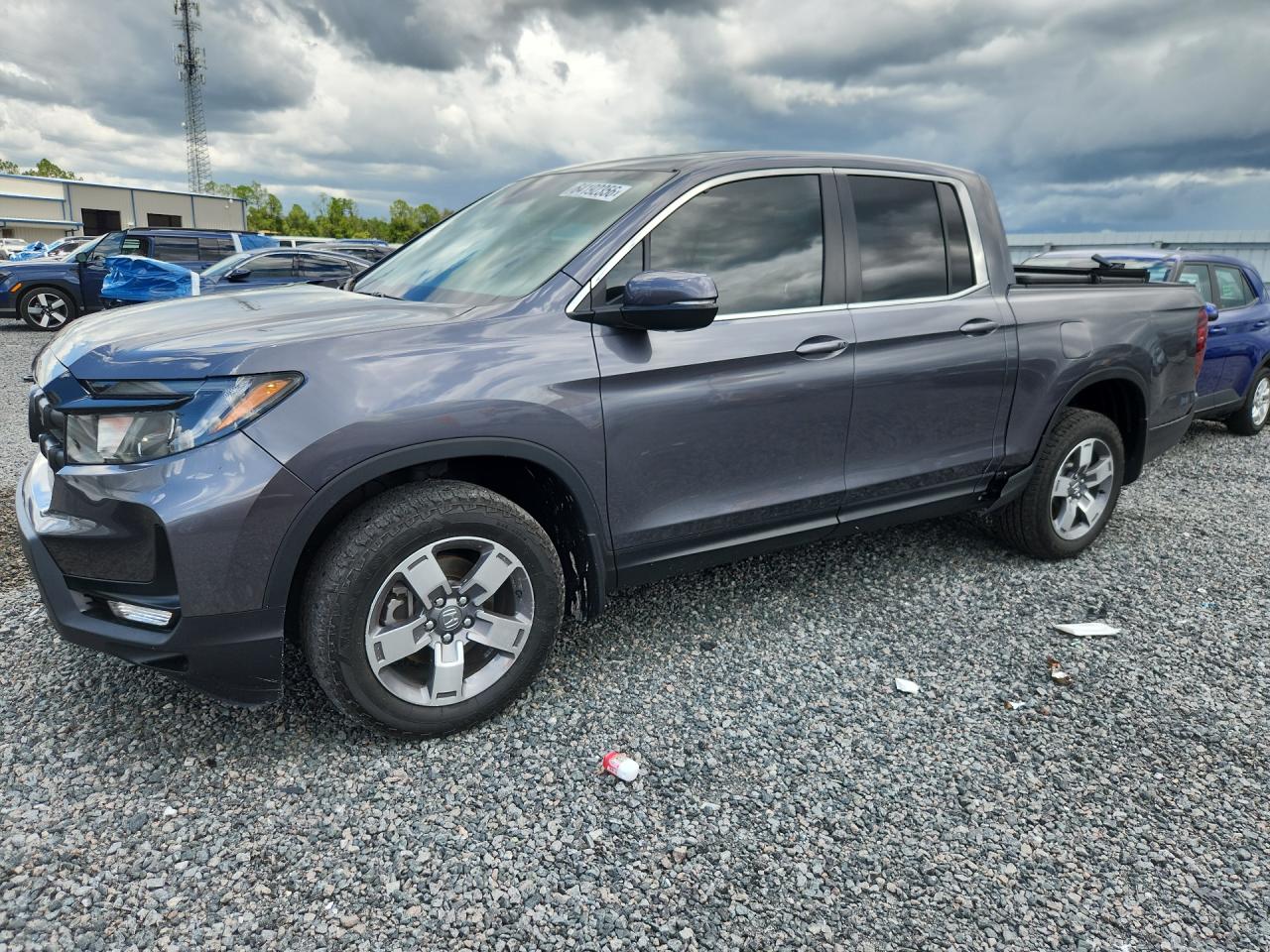 2024 Honda Ridgeline VIN 5FPYK3F50RB012771 — COPART salvage auction photo