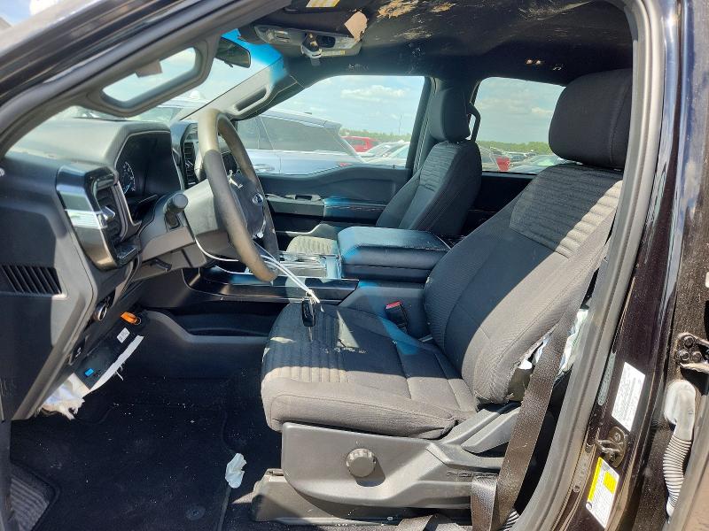 2023 Ford F-150 lightning VIN 1FTEW1C52PKF38909 COPART salvage auction — SIDE, TX - SALVAGE VEHICLE TITLE, sold $13,100 on 2026-08-21 (photo 7)