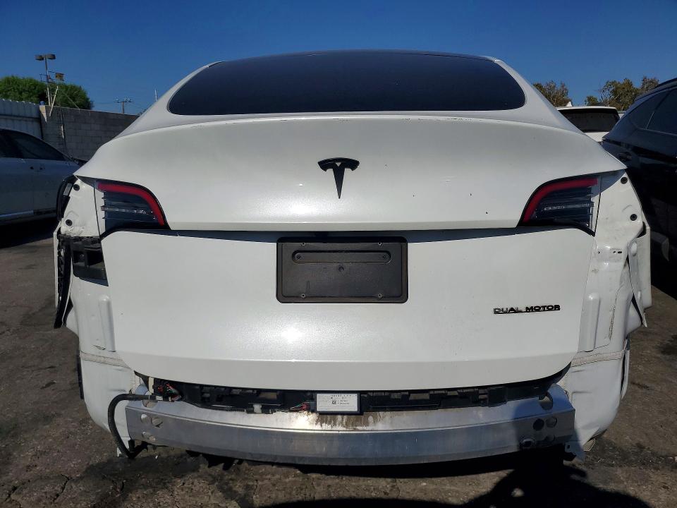 2023 Tesla Model y VIN 7SAYGDEEXPA153779 COPART salvage auction — SIDE, Ca - Salvage Certificate, sold $10,300 on 2026-08-31 (photo 6)