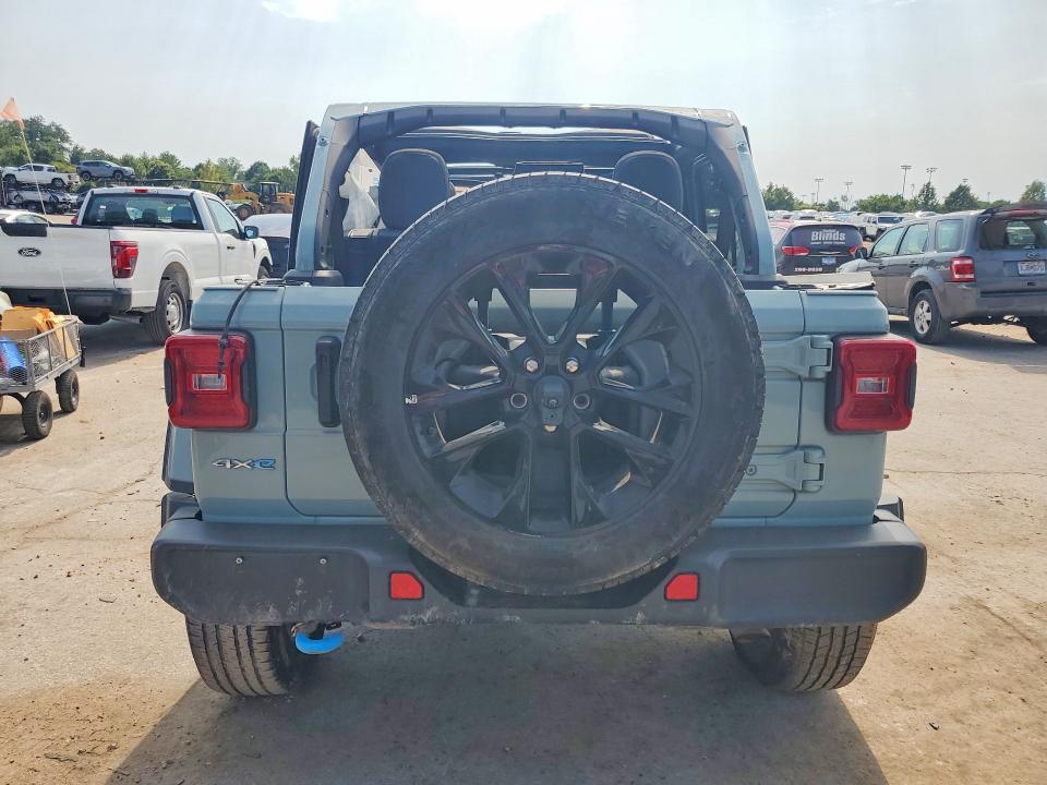 2024 Jeep Wrangler / VIN 1C4RJXP62RW276875 COPART salvage auction — ROLLOVER, Fl - Certificate Of Destruction (P), sold $9,000 on 2026-08-25 (photo 6)