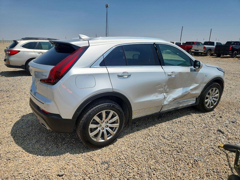 2022 Cadillac Xt4 VIN 1GYFZCR45NF137988 COPART salvage auction — SIDE, Tx - Salvage Vehicle Title, sold $8,700 on 2026-08-11 (photo 3)