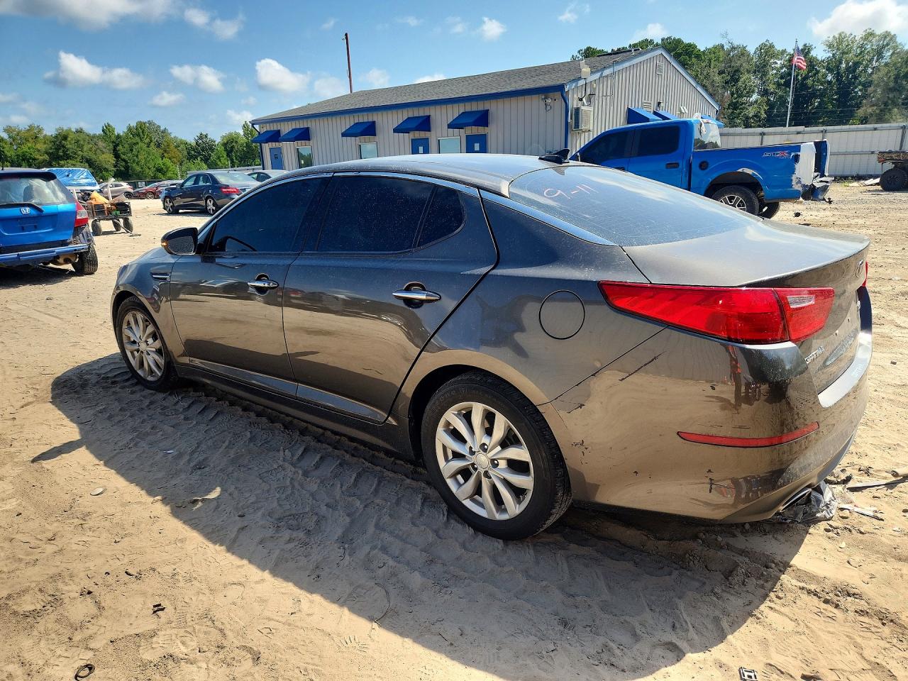 2015 Kia Optima VIN 5XXGN4A76FG391651 COPART salvage auction — Side, FL - CERT OF TITLE SLVG REBUILDABLE, sold $650 on 2026-09-14 (photo 2)