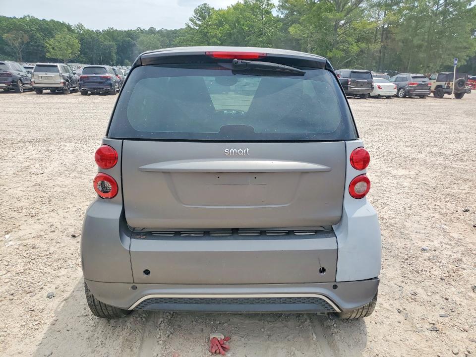 2013 Smart Fortwo VIN WMEEJ3BA2DK688749 COPART salvage auction — MINOR DENT/SCRATCHES, Ga - Dealer Only Salvage Title, sold $250 on 2026-08-21 (photo 6)