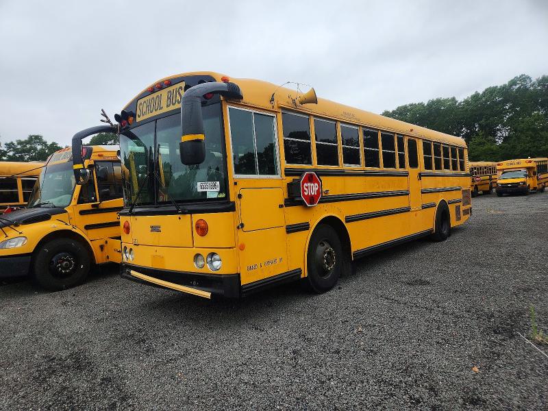 2012 Thomabuses VIN 1T7YN4E20C1150018 COPART salvage auction — MINOR DENT/SCRATCHES, RI - CERTIFICATE OF TITLE, sold $2,500 on 2026-09-22 (photo 2)
