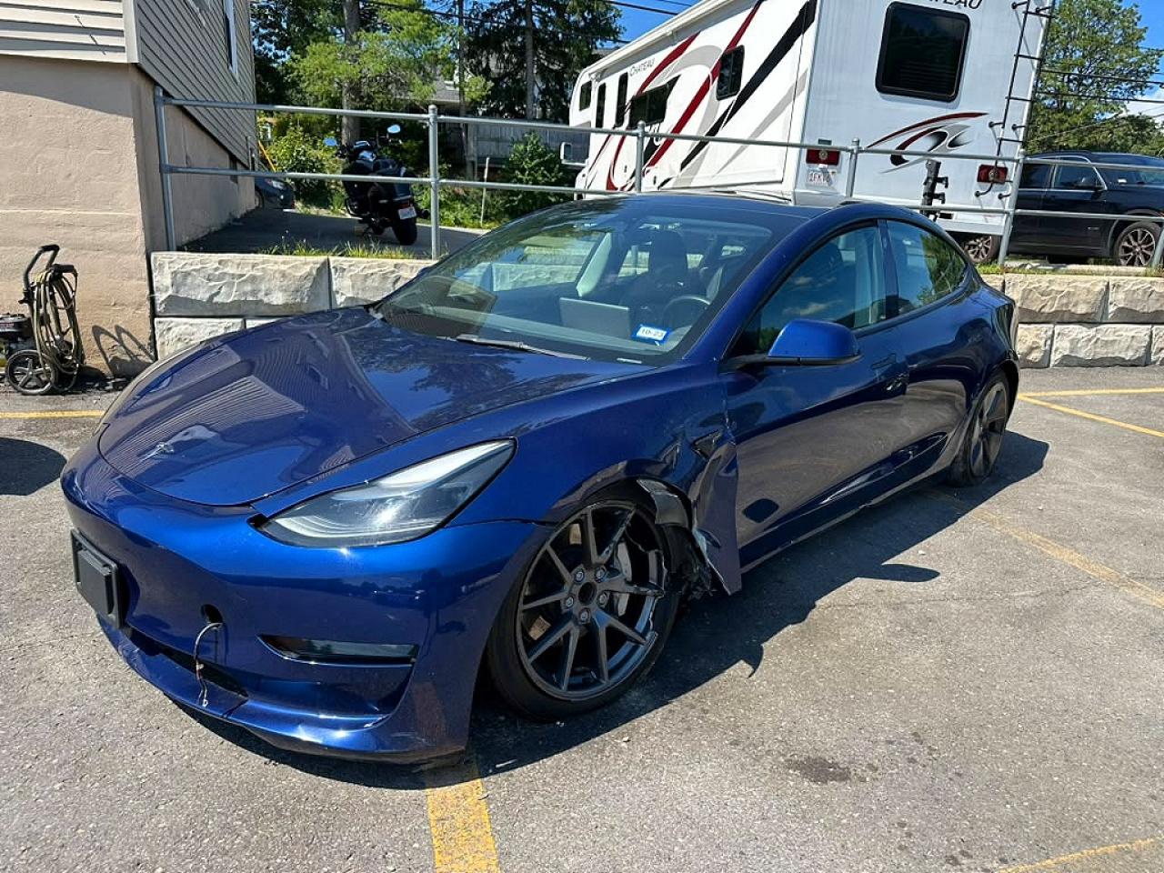 2023 Tesla Model 3 VIN 5YJ3E1EA1PF385831 — COPART salvage auction photo