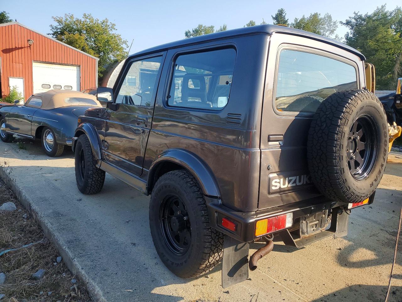 1986 Suzuki Samurai VIN JS3JC51V8G4110639 COPART salvage auction — Water/Flood, FL - CERT OF TITLE-SLVG REBLD FLOOD (P), sold $3,100 on 2026-09-09 (photo 2)