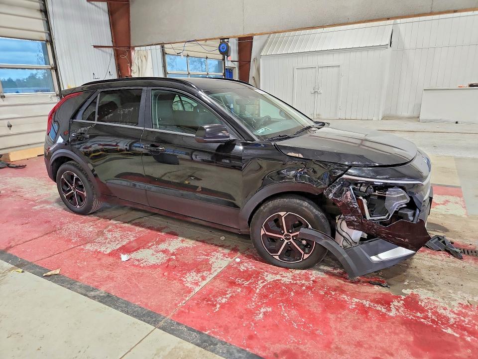 2025 Kia Niro VIN KNDCP3LE2S5306396 COPART salvage auction — SIDE, TX - SALVAGE VEHICLE TITLE, sold $7,400 on 2026-08-19 (photo 4)
