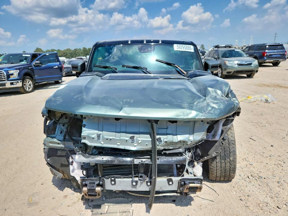2024 Gmc Hummer suv VIN 1GKB0RDC7RU100379 COPART salvage auction — FRONT END, AZ - CERT OF TITLE - SALVAGE, sold $23,600 on 2026-10-13 (photo 5)