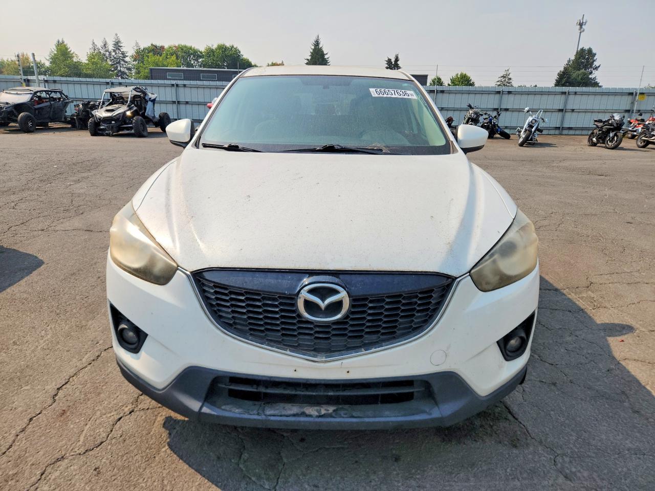 2013 Mazda CX-5 VIN JM3KE4CE8D0135104 COPART salvage auction — Rear End, OR - NON PUBLIC CLEAN TITLE, sold $2,050 on 2026-09-18 (photo 5)