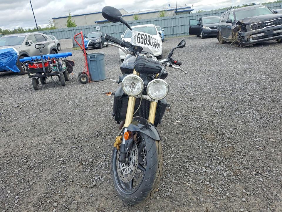 2010 Triumph motorcycle Street VIN SMTD01NEXAJ449484 COPART salvage auction — WATER/FLOOD, ON - PERMIT IRREPAIRABLE, sold $225 on 2026-09-03 (photo 2)