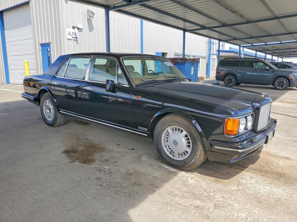 1995 Bentley Brooklands VIN SCBZE02C8SCX55174 COPART salvage auction — SIDE, CA - SALVAGE CERTIFICATE, sold $4,050 on 2026-09-08 (photo 4)
