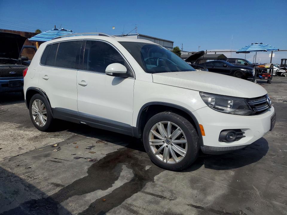 2014 Volkswagen Tiguan VIN WVGAV3AX4EW560199 COPART salvage auction — SIDE, Ca - Salvage Certificate, sold $1,450 on 2026-08-19 (photo 4)