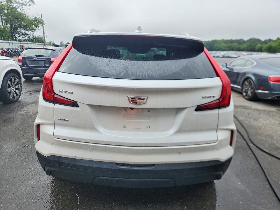 2024 Cadillac Xt4 VIN 1GYFZBR45RF142866 COPART salvage auction — WATER/FLOOD, Pa - Cert Of Salvage-W=Flood Veh, sold $13,700 on 2026-09-01 (photo 6)