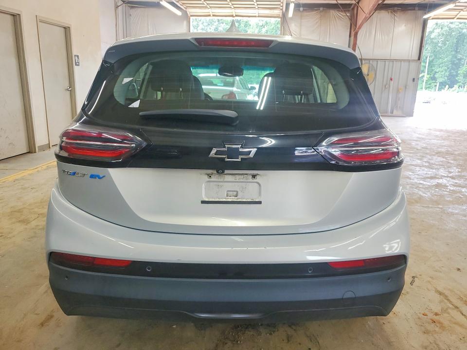 2023 Chevrolet Bolt VIN 1G1FX6S01P4136977 COPART salvage auction — SIDE, FL - DEALER ONLY CLEAN TITLE (P), sold $7,800 on 2026-09-29 (photo 6)