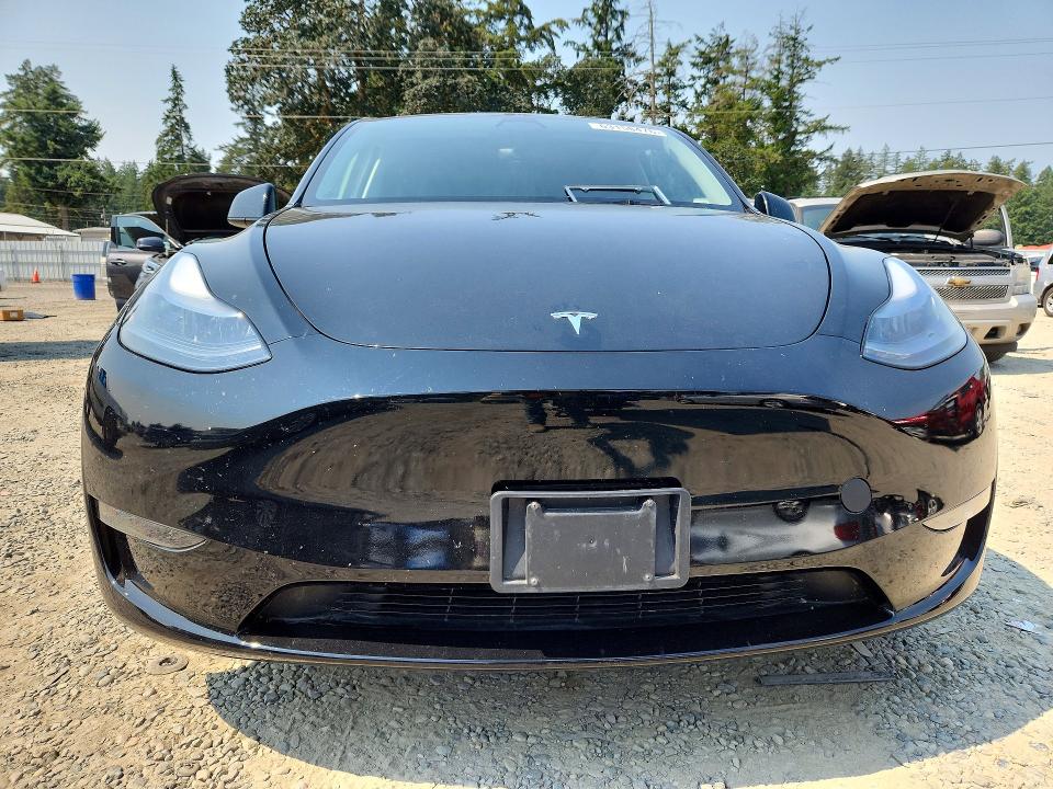 2023 Tesla Model y VIN 7SAYGDEEXPF753673 COPART salvage auction — REAR END, Wa - Bill Of Sale, sold $14,100 on 2026-08-28 (photo 5)