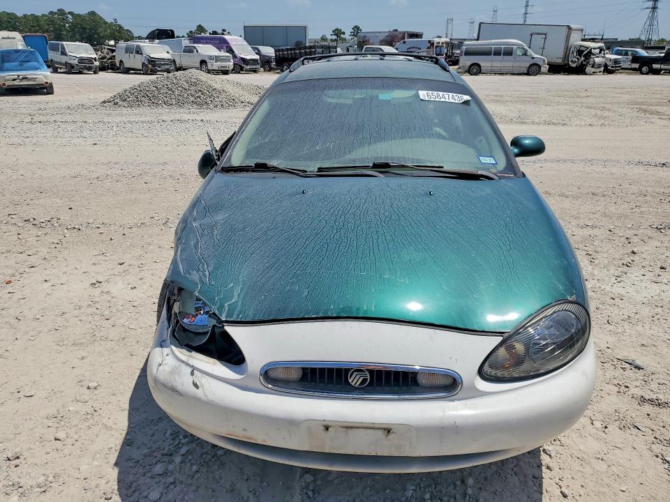 1999 Mercury Sable VIN 1MEFM58SXXG630383 COPART salvage auction — FRONT END, TX - SALVAGE VEHICLE TITLE (P), sold $200 on 2026-09-04 (photo 5)