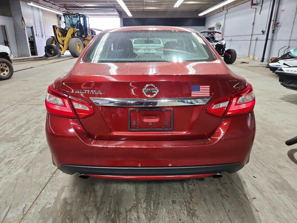 2016 Nissan Altima VIN 1N4AL3AP9GN324737 COPART salvage auction — MINOR DENT/SCRATCHES, Salvage Title, sold $250 on 2026-09-14 (photo 6)