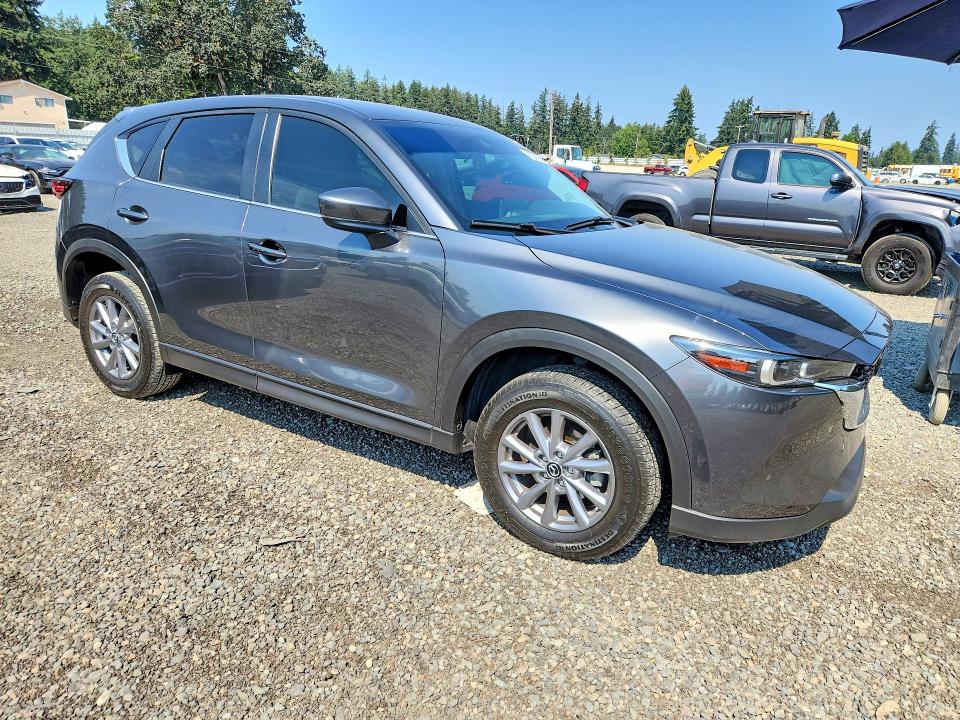 2023 Mazda Cx-5 VIN JM3KFBBM0P0216886 COPART salvage auction — SIDE, WA - BILL OF SALE, sold $7,000 on 2026-09-04 (photo 4)
