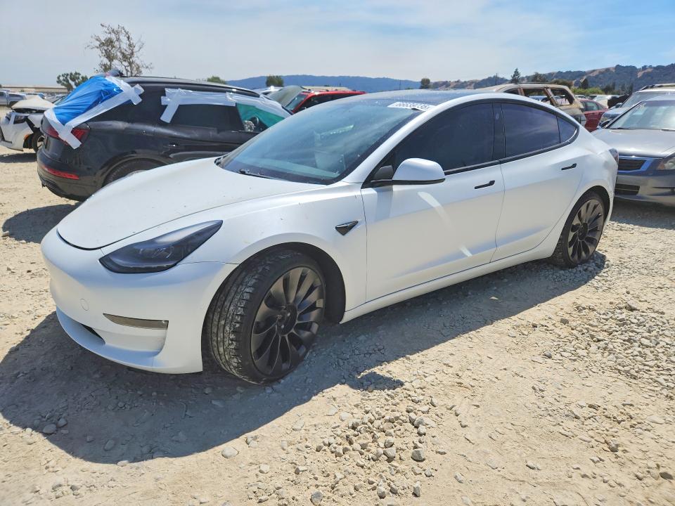2021 Tesla Model 3 VIN 5YJ3E1EC9MF074001 — COPART salvage auction photo