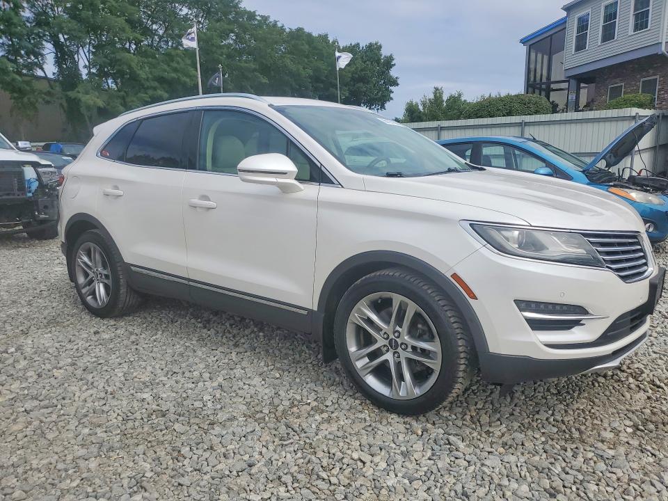 2015 Lincoln Mkc VIN 5LMTJ2AH6FUJ03671 COPART salvage auction — NORMAL WEAR, OH - CERTIFICATE OF TITLE, sold $1,200 on 2026-09-30 (photo 4)