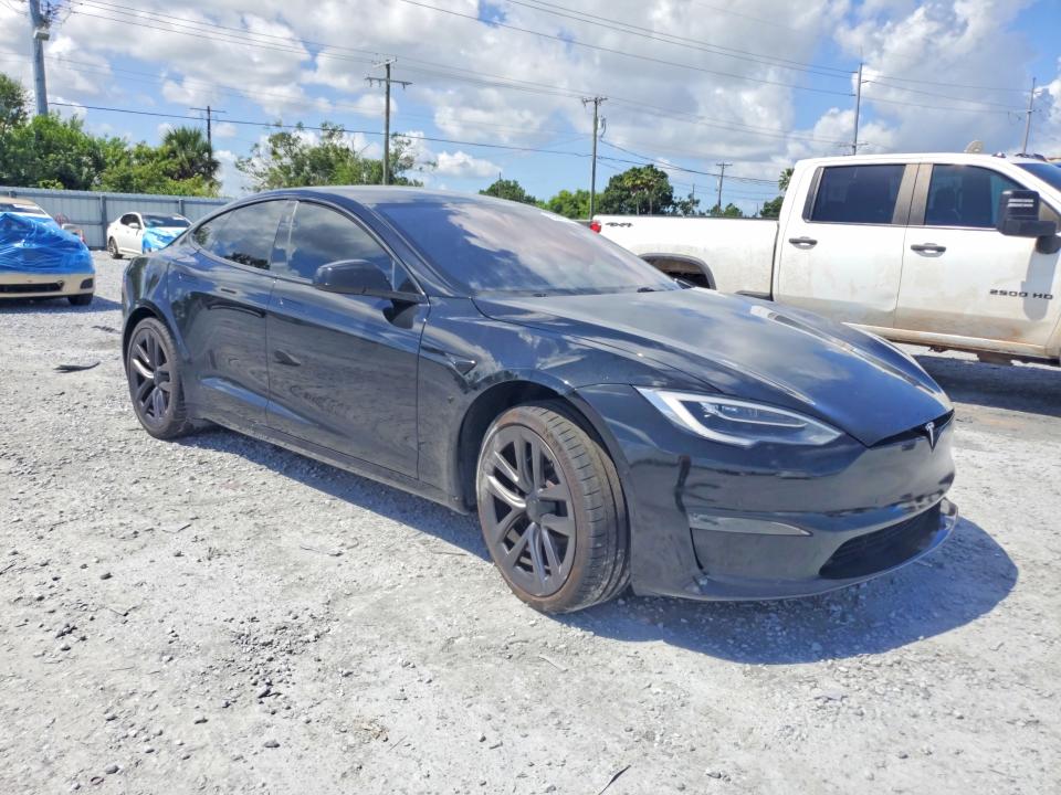 2021 Tesla Model s VIN 5YJSA1E62MF452435 COPART salvage auction — UNDERCARRIAGE, Fl - Cert Of Ttl-Rebuilt&Slvg Rbld, sold $16,000 on 2026-08-28 (photo 4)