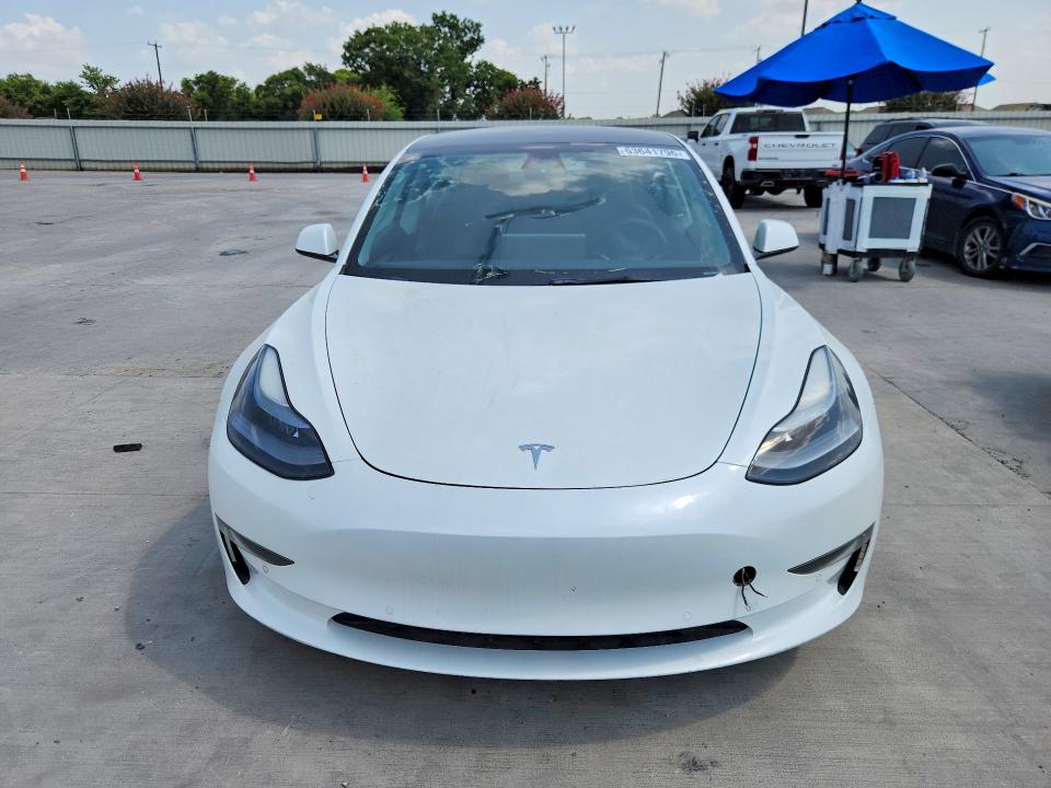 2021 Tesla Model 3 VIN 5YJ3E1EA8MF100280 COPART salvage auction — MINOR DENT/SCRATCHES, SC - CERTIFICATE OF TITLE, sold $11,300 on 2026-09-10 (photo 5)
