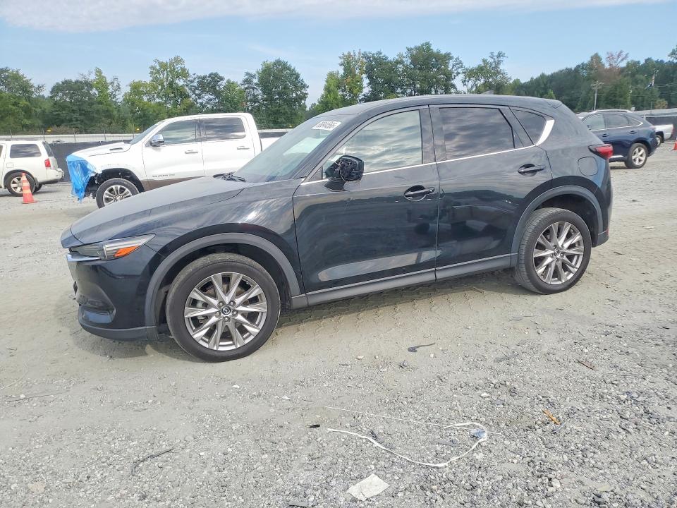 2019 Mazda Cx-5 VIN JM3KFBDY0K0519921 COPART salvage auction — MINOR DENT/SCRATCHES, NC - CERTIFICATE OF TITLE (P), sold $0 on 2026-09-18 (photo 1)