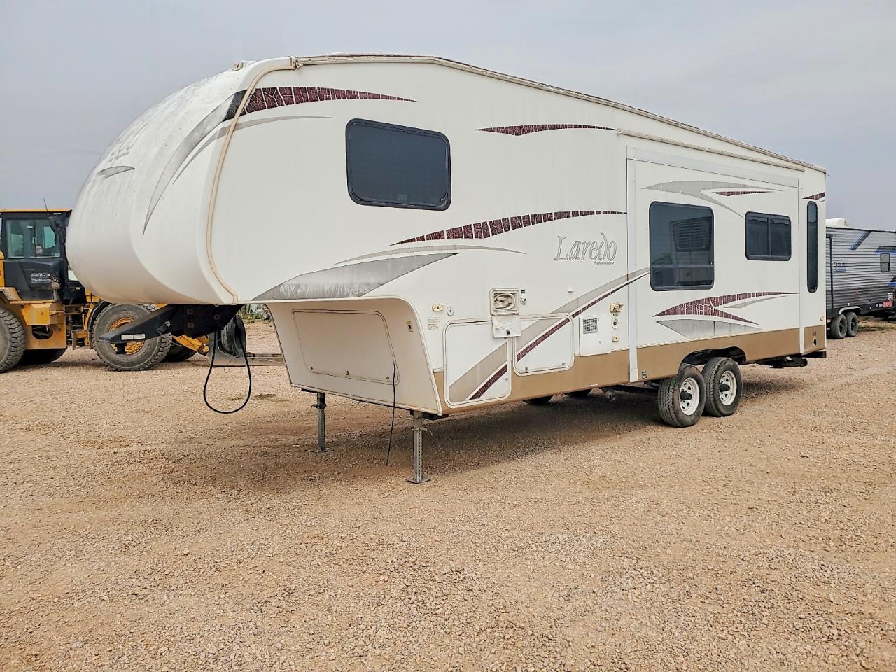 2009 Keystone Laredo VIN 4YDF265279L601027 COPART salvage auction — Hail, SD - CERTIFICATE OF TITLE, sold $2,499 on 2026-10-02 (photo 2)