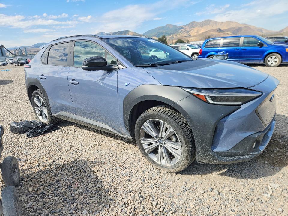 2023 Subaru Solterra VIN JTMABABA2PA034102 COPART salvage auction — SIDE, UT - SALVAGE CERTIFICATE, sold $7,900 on 2026-10-09 (photo 4)