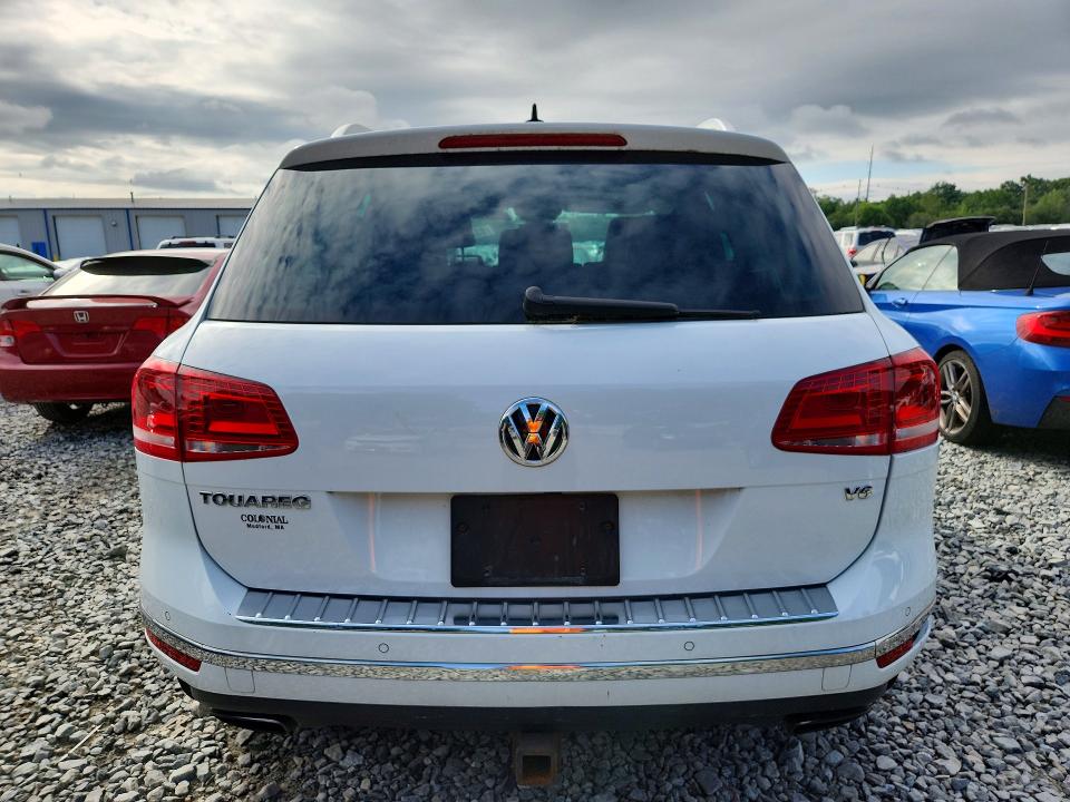 2016 Volkswagen Touareg VIN WVGEF9BP9GD006400 COPART salvage auction — MINOR DENT/SCRATCHES, Ma - Certificate Of Title, sold $500 on 2026-08-13 (photo 6)