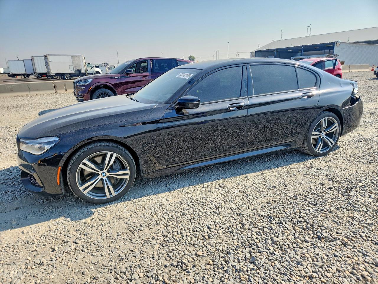 2016 BMW 7 Series VIN WBA7F2C59GG418927 — COPART salvage auction photo