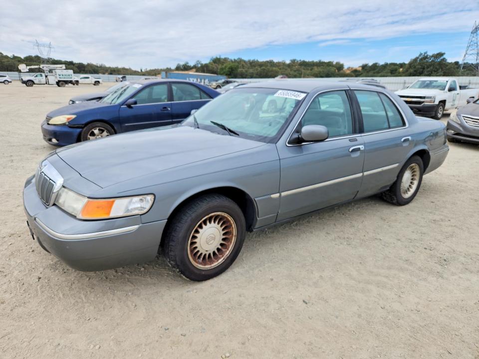 2000 Mercury Grand marquis VIN 2MEFM75W9YX620393 COPART salvage auction — MINOR DENT/SCRATCHES, Ca - Dis/Dlr/Exp App For Dup Clean, sold $950 on 2026-10-09 (photo 1)