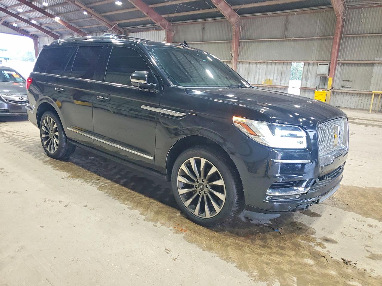 2021 Lincoln Navigator VIN 5LMJJ2LT9MEL01340 COPART salvage auction — Minor Dent/Scratches, Ct - Clean Title, sold $9,600 on 2026-09-25 (photo 4)