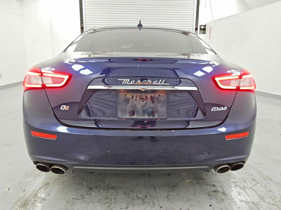 2016 Maserati Ghibli VIN ZAM57RTA2G1183833 COPART salvage auction — MECHANICAL, Tx - Certificate Of Title, sold $1,050 on 2026-08-18 (photo 6)