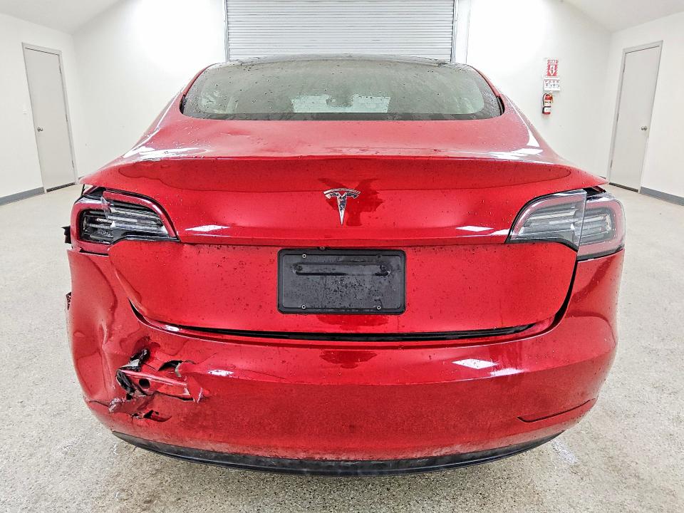 2023 Tesla Model 3 VIN 5YJ3E1EA6PF451158 COPART salvage auction — REAR END, CO - CERTIFICATE OF TITLE, sold $7,600 on 2026-09-01 (photo 6)