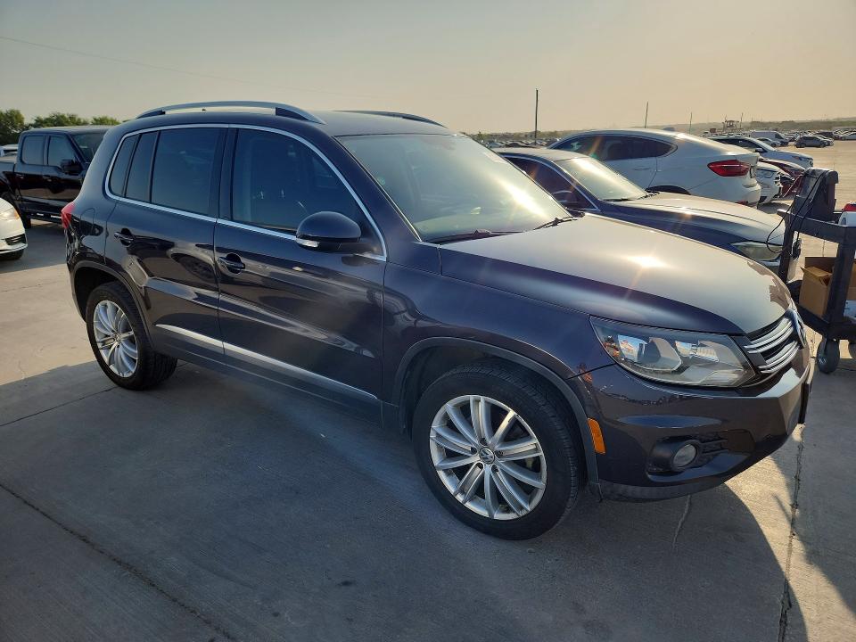 2016 Volkswagen Tiguan VIN WVGAV7AX3GW596329 COPART salvage auction — NORMAL WEAR, Tx - Certificate Of Title, sold $2,000 on 2026-08-10 (photo 4)