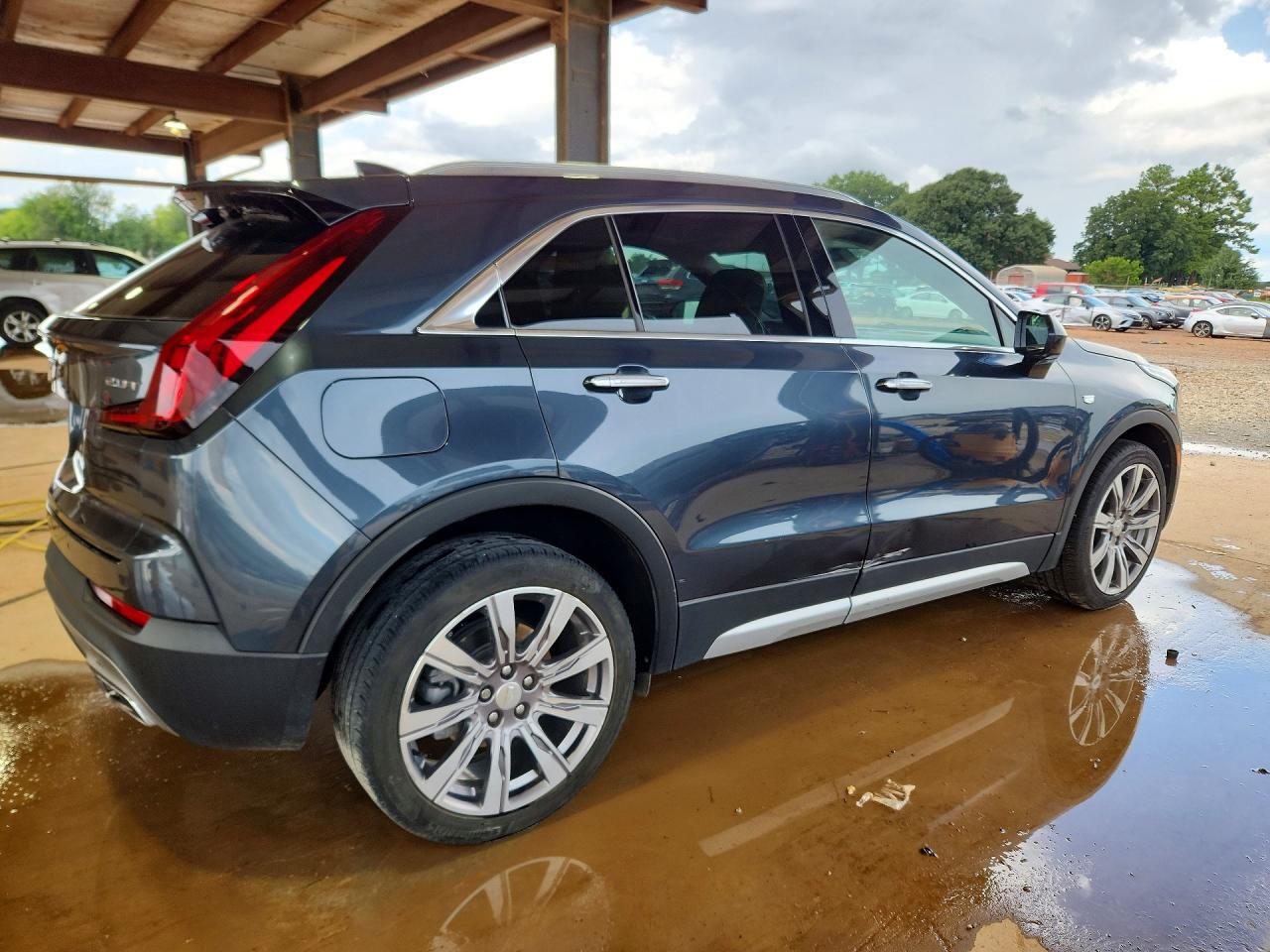 2019 Cadillac XT4 VIN 1GYFZCR42KF199845 COPART salvage auction — Side, St - Salvage Title, sold $7,100 on 2026-09-02 (photo 3)