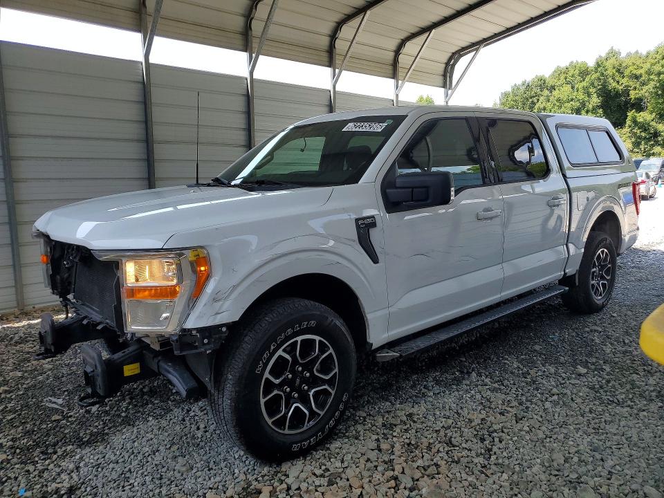 2021 Ford F-150 lightning VIN 1FTFW1E57MKF05787 — COPART salvage auction photo