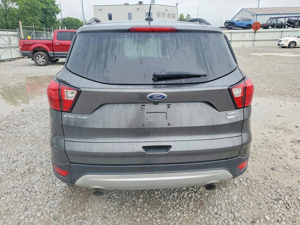 2019 Ford Escape VIN 1FMCU9HDXKUB23907 COPART salvage auction — MINOR DENT/SCRATCHES, Oh - Certificate Of Title, sold $2,650 on 2026-09-11 (photo 6)