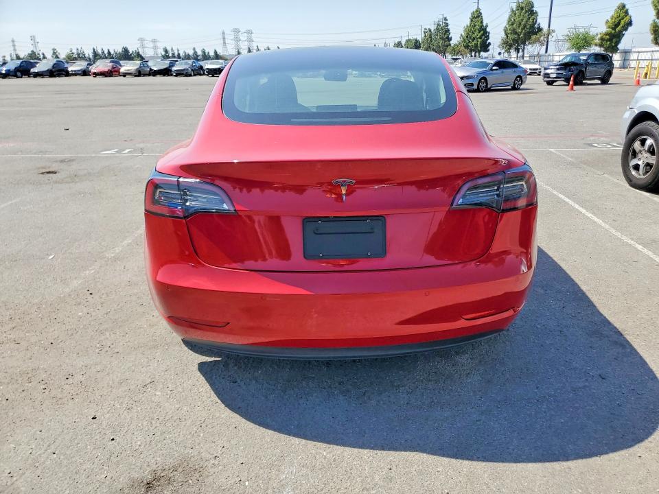 2022 Tesla Model 3 VIN 5YJ3E1EAXNF304189 COPART salvage auction — NORMAL WEAR, Ca - Dis/Dlr/Exp Only Clean Title, sold $7,600 on 2026-09-01 (photo 6)