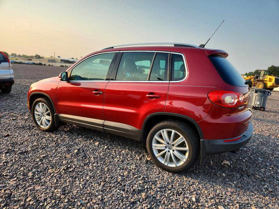 2011 Volkswagen Tiguan VIN WVGBV7AX2BW001063 COPART salvage auction — MINOR DENT/SCRATCHES, MO - CERTIFICATE OF TITLE, sold $700 on 2026-08-12 (photo 2)
