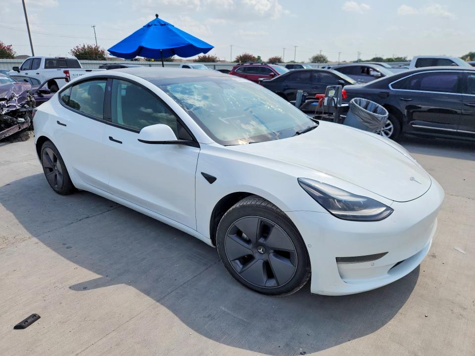 2021 Tesla Model 3 VIN 5YJ3E1EA8MF100280 COPART salvage auction — MINOR DENT/SCRATCHES, SC - CERTIFICATE OF TITLE, sold $11,300 on 2026-09-10 (photo 4)