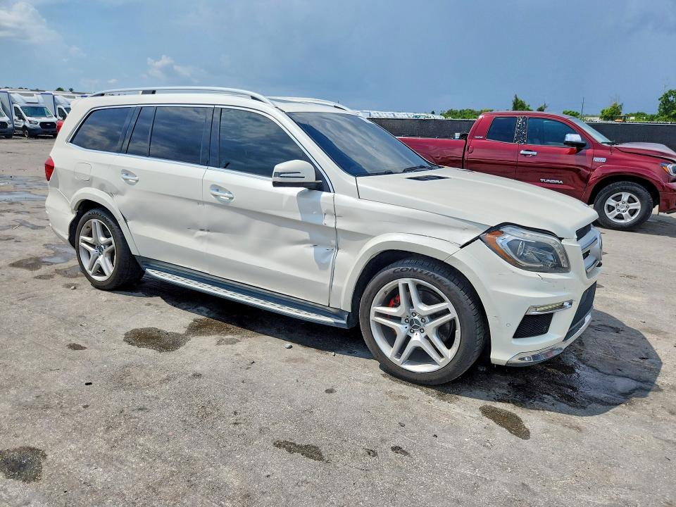 2014 Mercedes-benz Gl-klasse VIN 4JGDF7DE4EA310261 COPART salvage auction — SIDE, Fl - Cert Of Title Slvg Rebuildable, sold $7,100 on 2026-09-15 (photo 4)