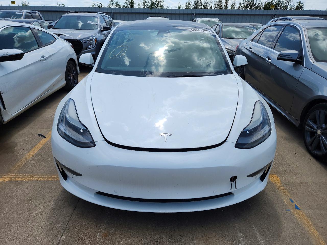 2021 Tesla Model 3 VIN 5YJ3E1EA8MF100280 COPART salvage auction — Minor Dent/Scratches, SC - CERTIFICATE OF TITLE, sold $9,700 on 2026-09-11 (photo 5)