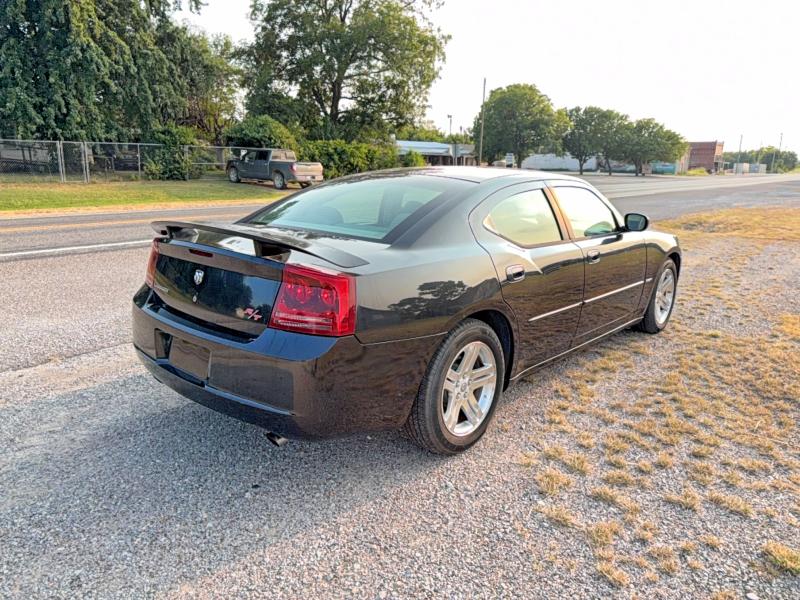 2006 Dodge Charger VIN 2B3LA53H26H427128 COPART salvage auction — NORMAL WEAR, FL - CERTIFICATE OF TITLE (P), sold $4,500 on 2026-08-13 (photo 4)